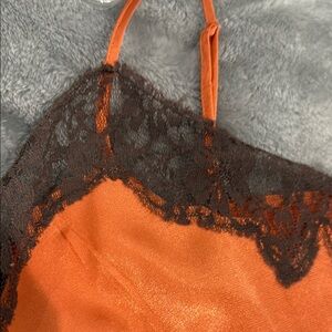 Newport News Orange Satin Top with Black Lace